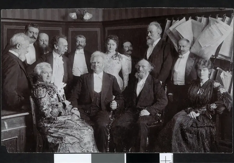 A formal group of men and women gathered in a room, restored